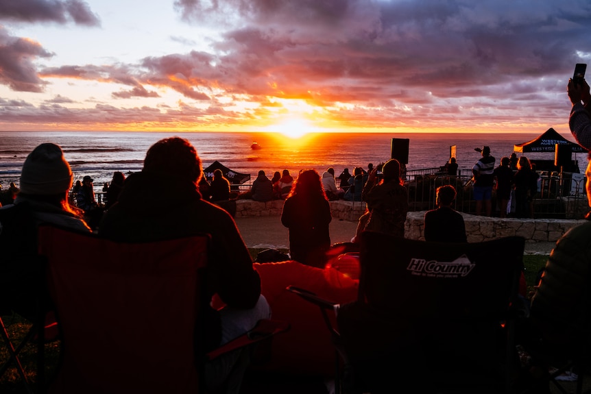 People watching a sunset