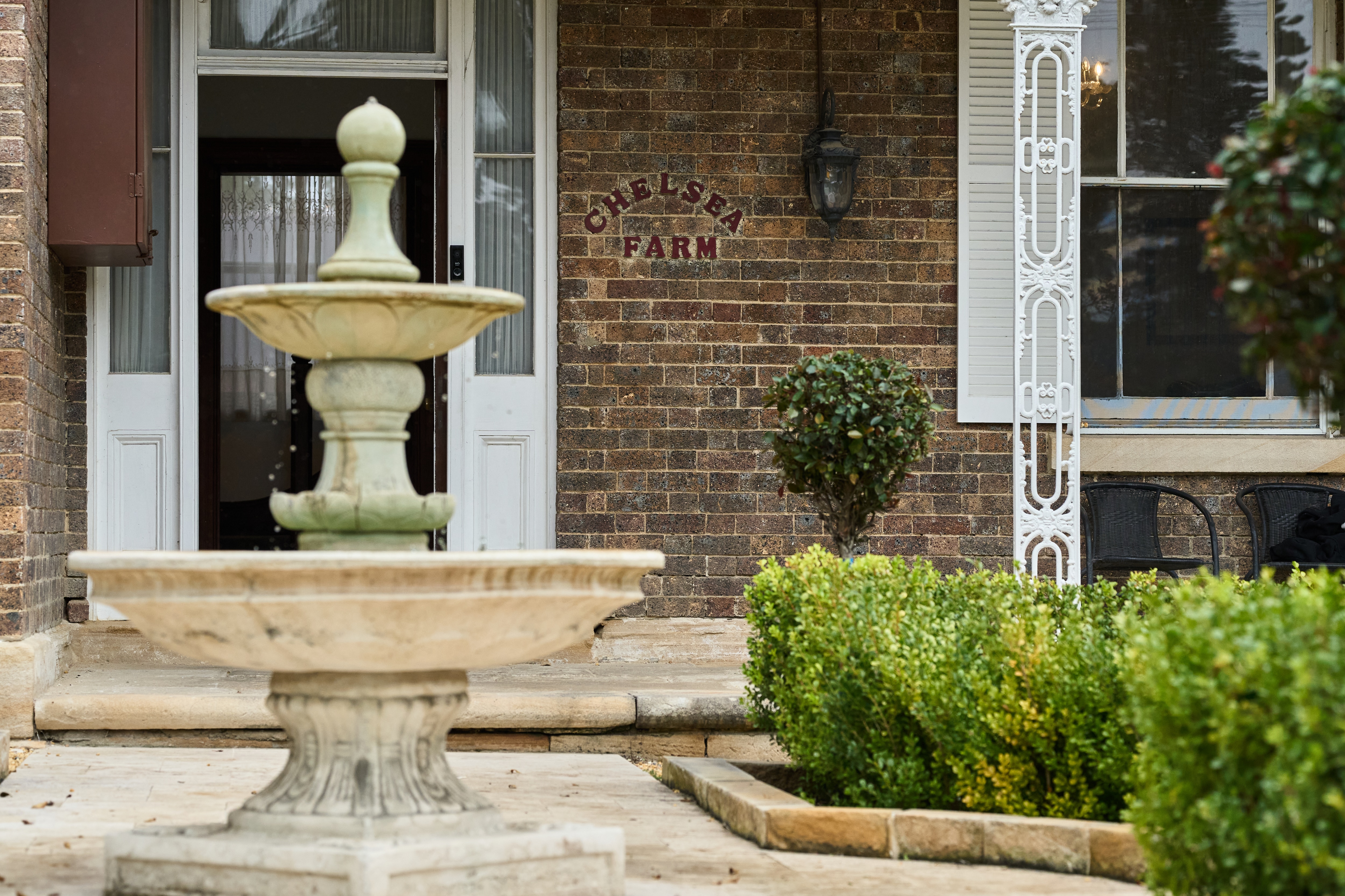 A heritage-listed home made of brick, with historic features throughout.