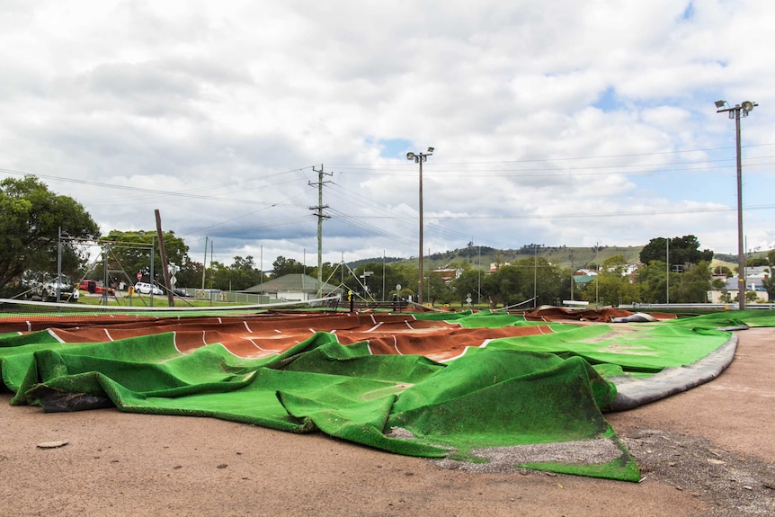 Dungog's tennis courts were destroyed in the 'April superstorm'.
