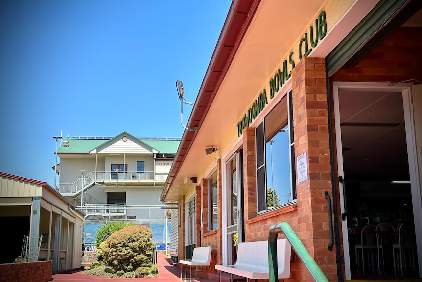 a bowls club in the foreground and stadium in the background