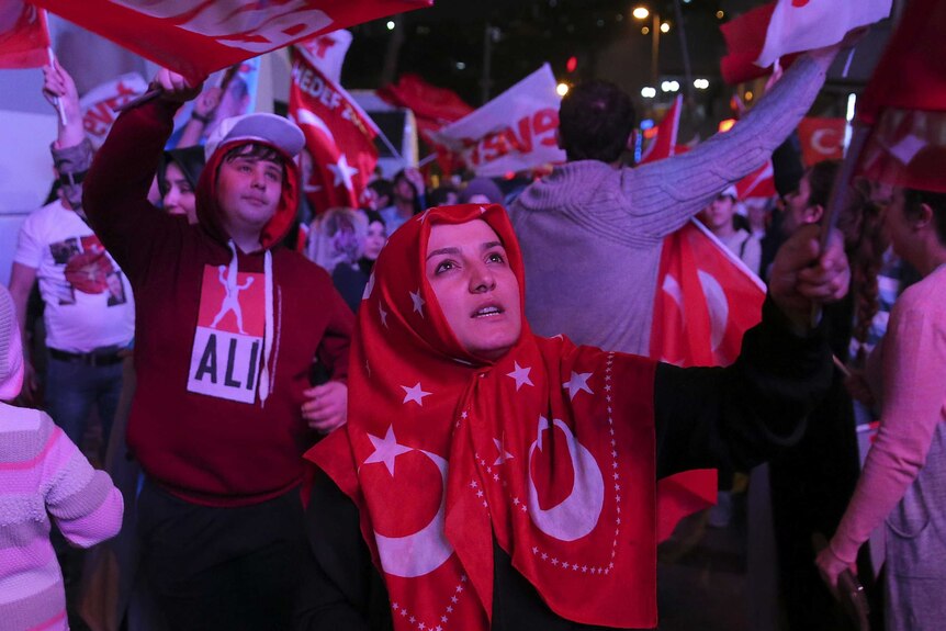 Supporters of Turkish President Tayyip Erdogan celebrate.