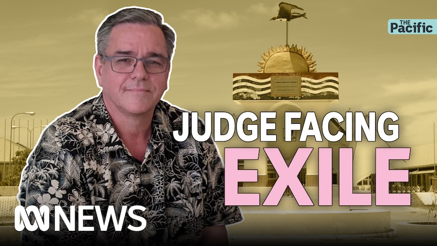 Man wears glasses with Kiribati flag behind him. Text reads 'Judge facing exile'.