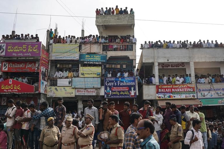 People clash with police in Shadnagar, India, after the rape and murder of a woman at an underpass