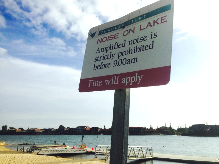 Sign warns of noise regulations for rowers at West Lakes