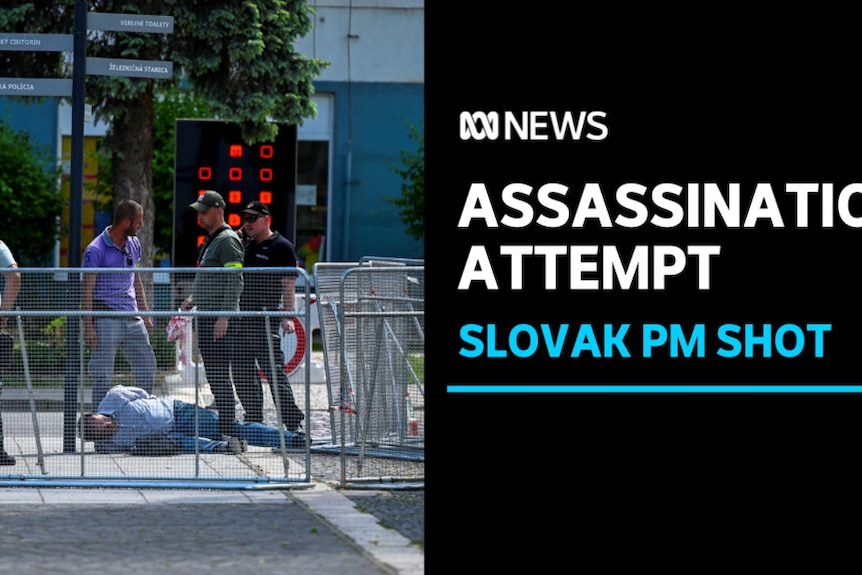 Assassination Attempt, Slovak PM Shot: A person lies on the ground on a street with three men standing over him.