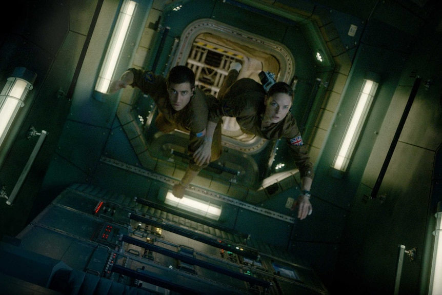 Jake Gyllenhaal and Rebecca Ferguson on the International Space Station in a scene from the film Life.