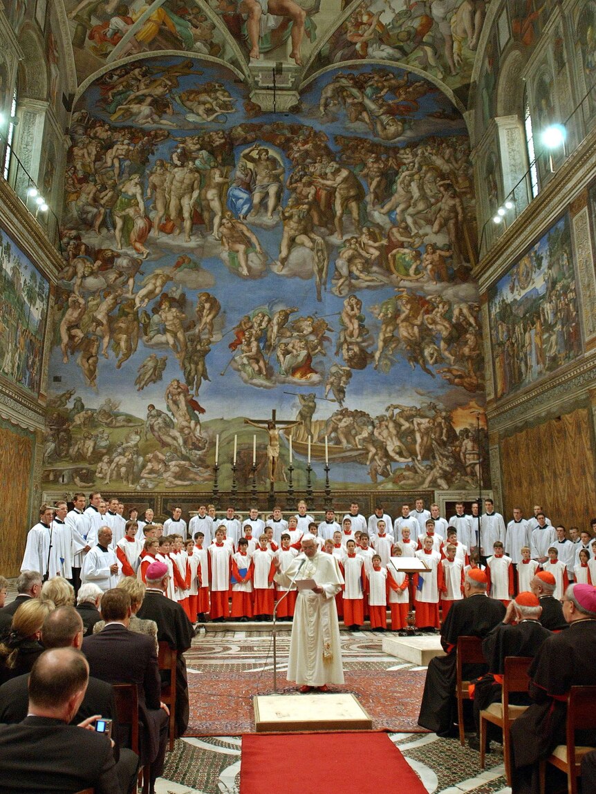 Pope and boys' choir stand before a congregation at Sistine Chapel