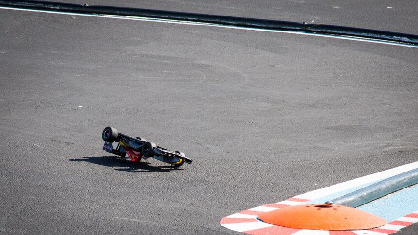 The model cars are flipped on occasions from going too hard around corners and bends.