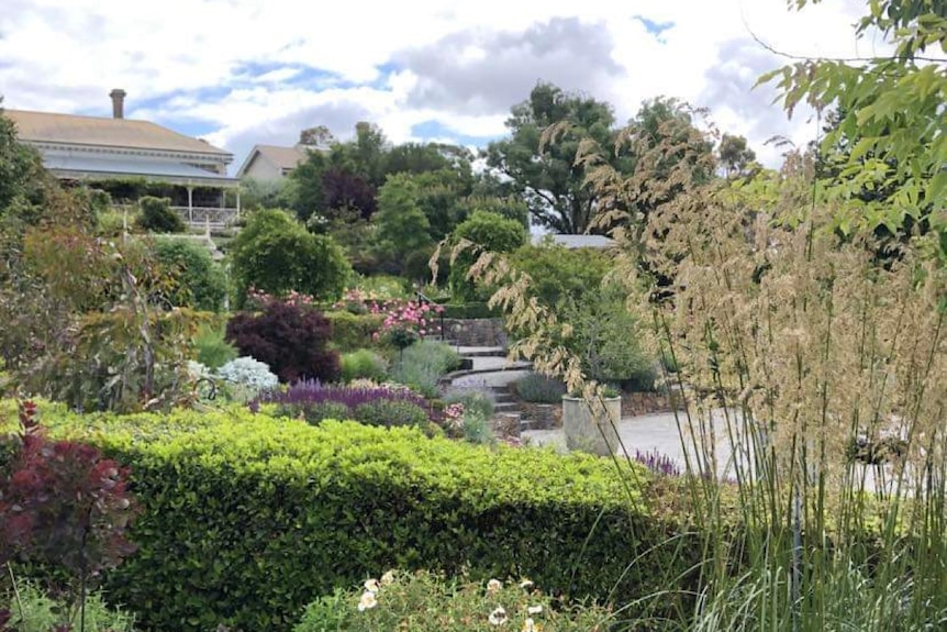 Lush, English-style gardens near an historic homestead.