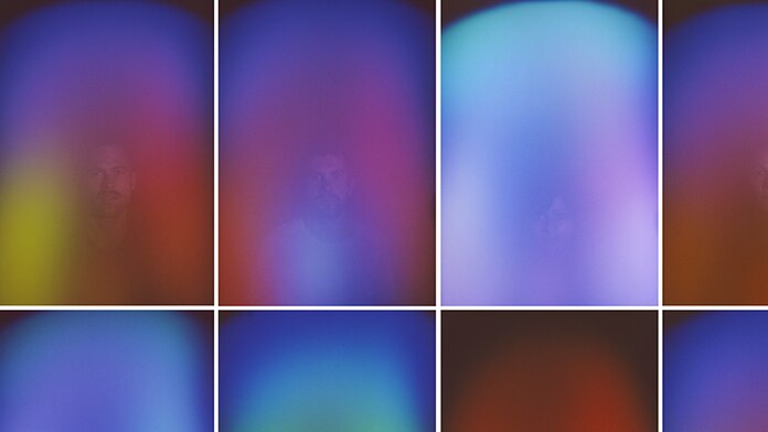 A grid of 10 faint portraits of people each covered in different vibrant washes of blue, purple, green, blue and red hues.