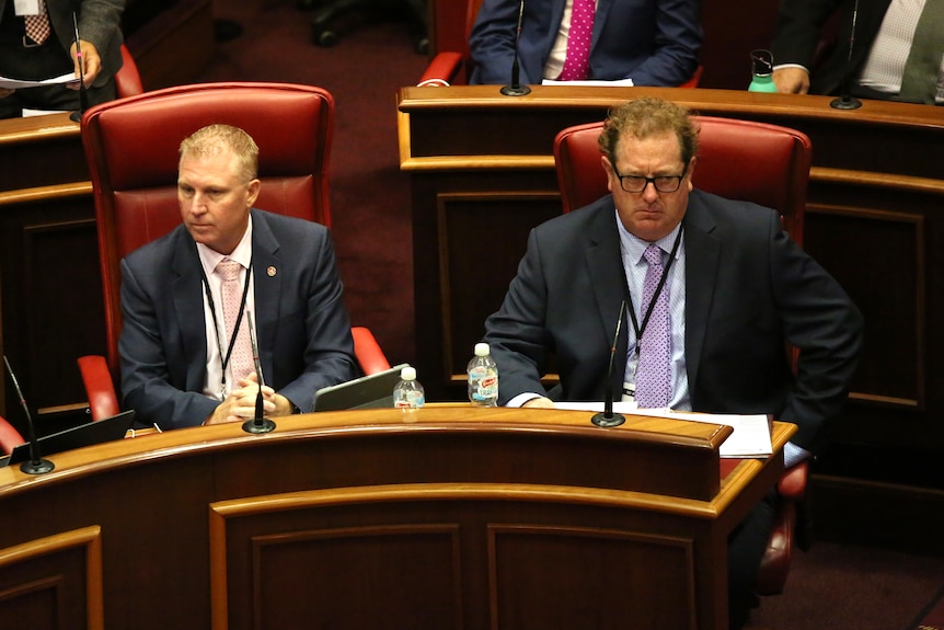 Ben Dawkins sitting in WA's Legislative Council with James Hayward on his right.