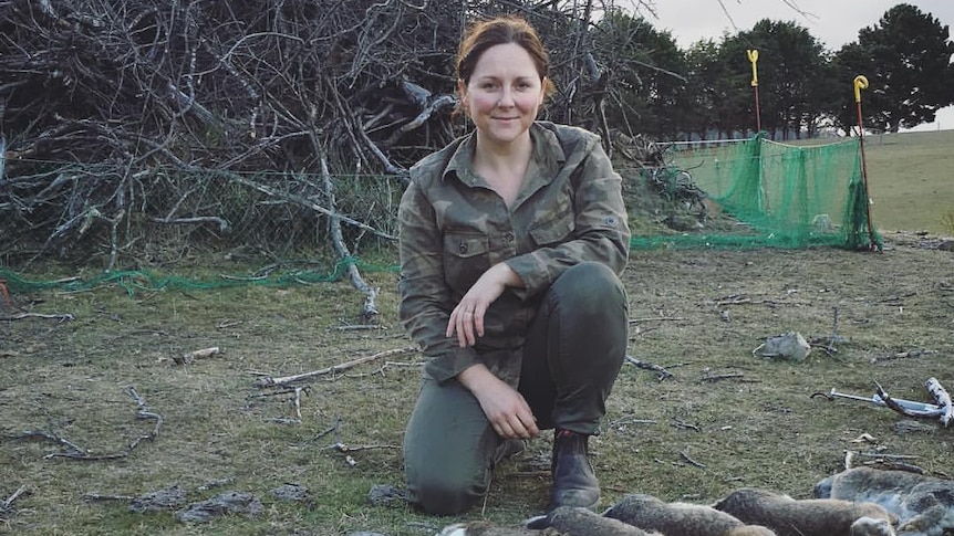 Shauna Mayben Pickin with rabbits