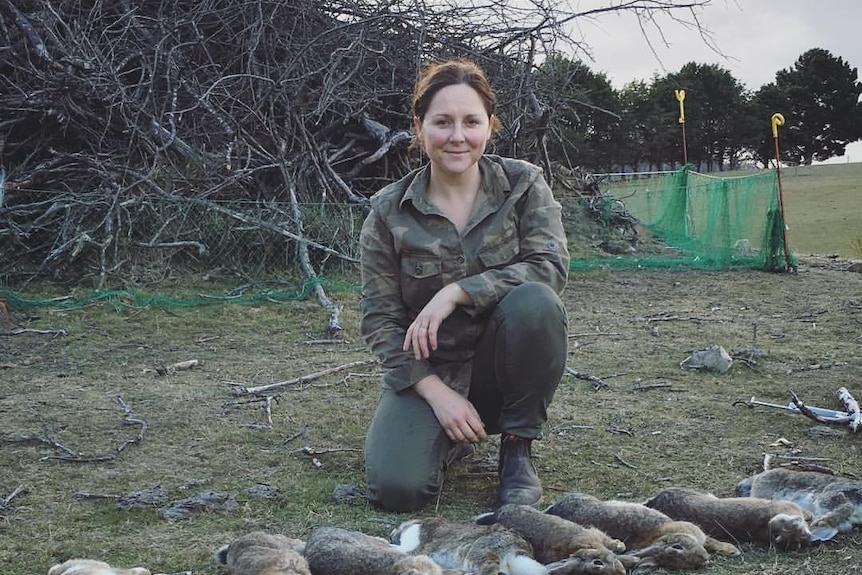 Shauna Mayben Pickin with rabbits