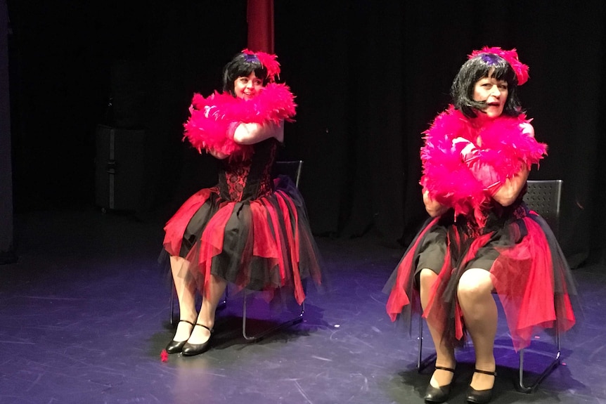 Two women perform a cabaret.