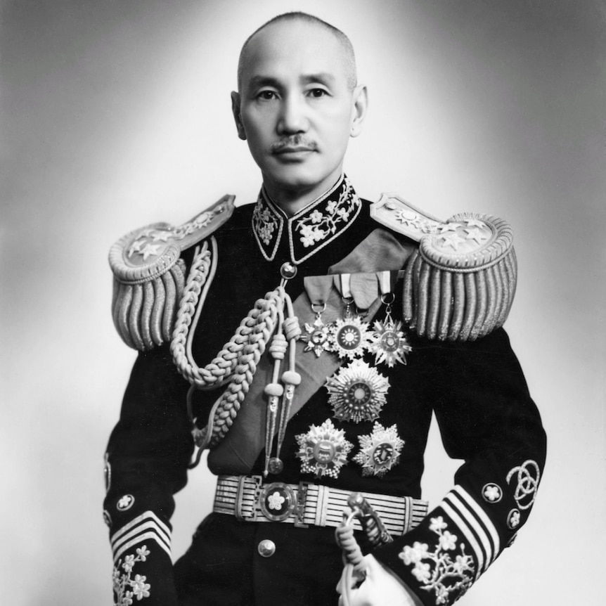 A black and white photo of a man in full military dress 