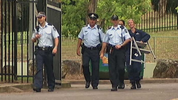 Police leave Melba Copland Secondary School after attending the scene of the alleged stabbing.