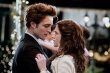 Robert Pattinson and Kristen Stewart as Edward Cullen and Bella Swan