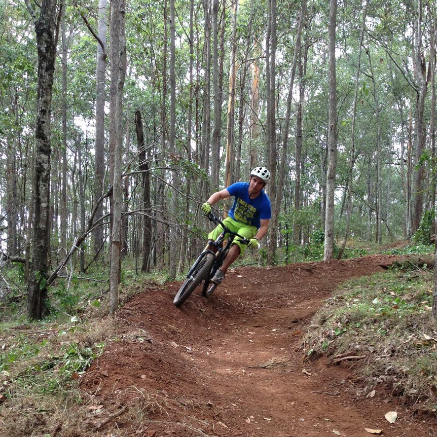 Andrew Wilson rides through Cornubia Forest Park