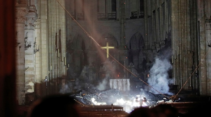 Smoke drifts through the interior of Notre Dame cathedral.