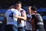 The Roosters' Sonny Bill Williams with Shaun Kenny-Dowall (#4) after a try against the Warriors.