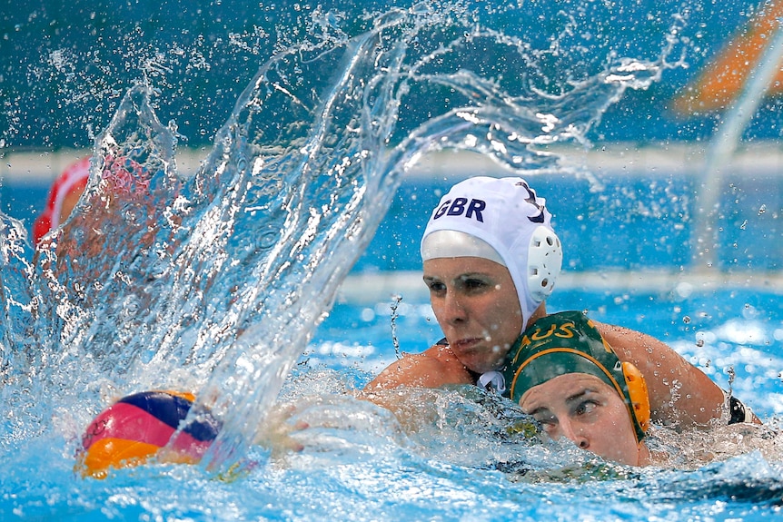 Britain's Fiona McCann (top) and Australia's Ash Southern fight for the ball.