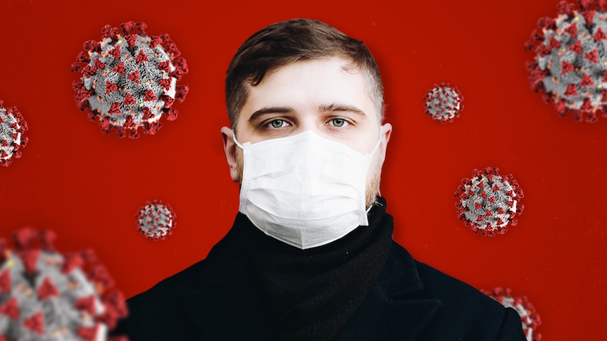 A picture of a man wearing a mask with a red background