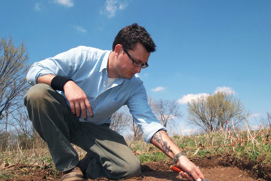 Archaeologist Aaron Deter-Wolf in the field.