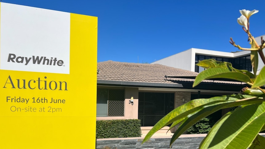 Ray White auction sign outside home