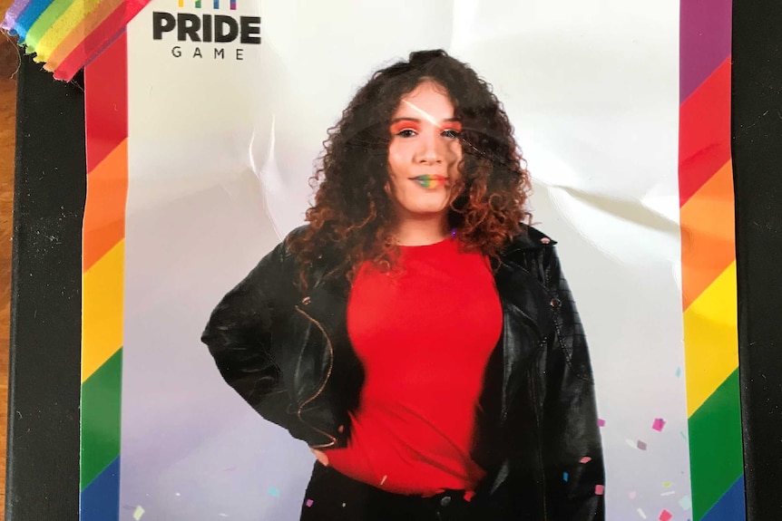 Transgender teenager Korra dressed for the "Pride Game".