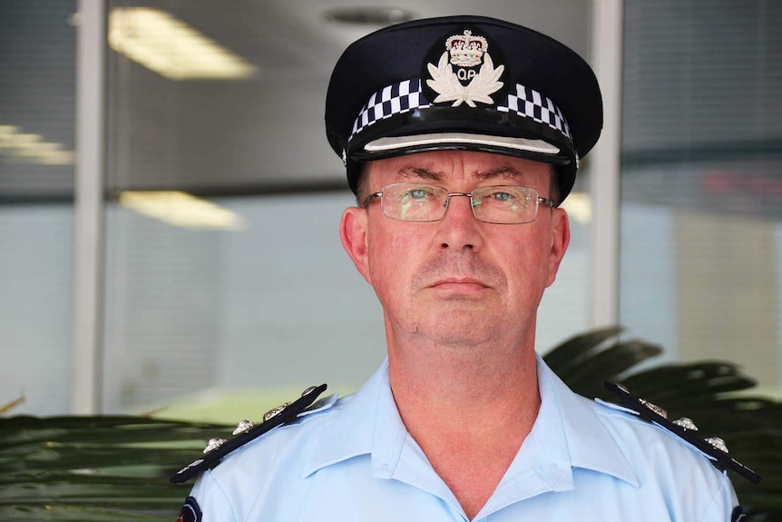 Far north Queensland Police Chief Superintendent Brett Schafferius looks at camera with serious expression on his face.