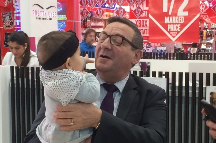 Labor candidate for Hindmarsh Steve Georganas and a baby