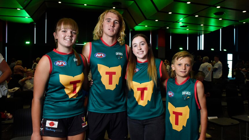 Young players wearing the Tasmania Devils foundation guernsey design at Launceston launch event for the Tasmania Football Club.