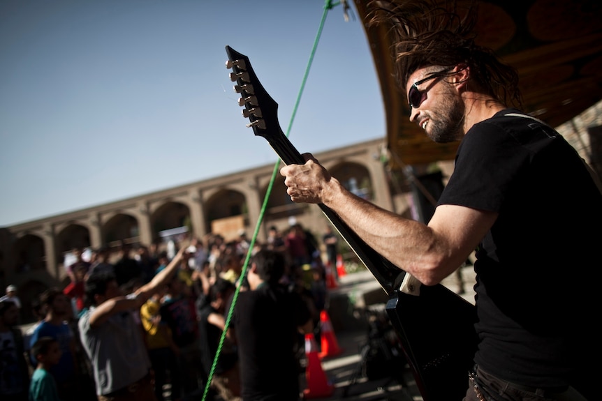 Australian Travis Beard performs during Sound Central in Kabul on October 1, 2011