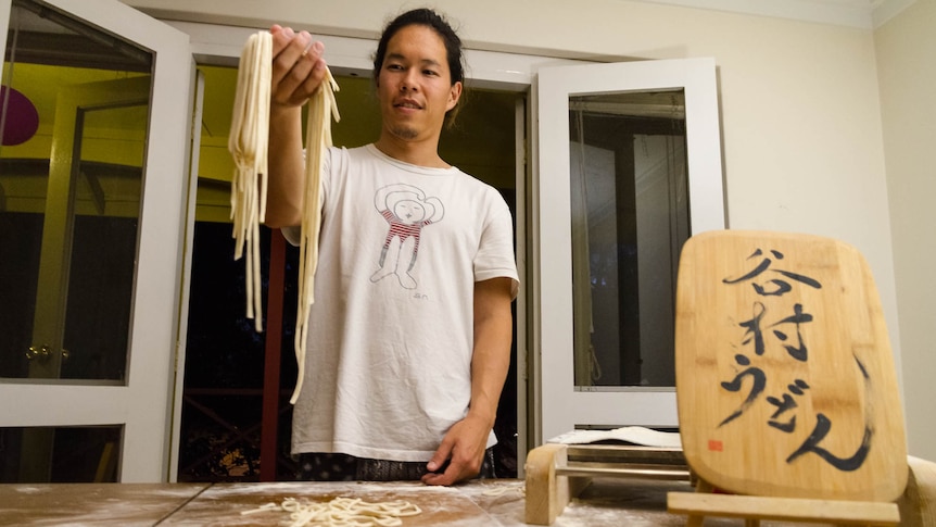 Jon Tanimura shows off his hand made udon noodles.