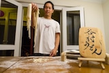 Jon Tanimura shows off his hand made udon noodles.
