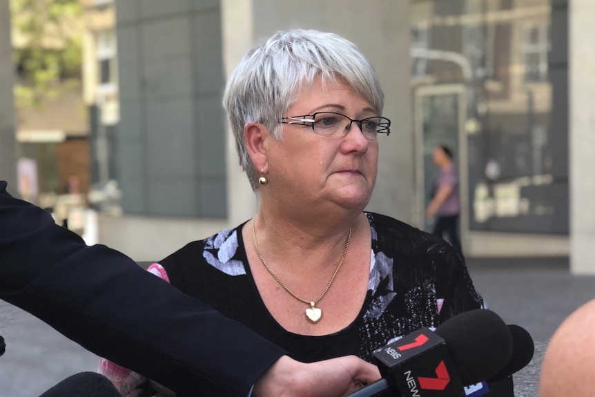 Jennifer Morant's friend Judy Dent crying outside the Supreme Court in Brisbane