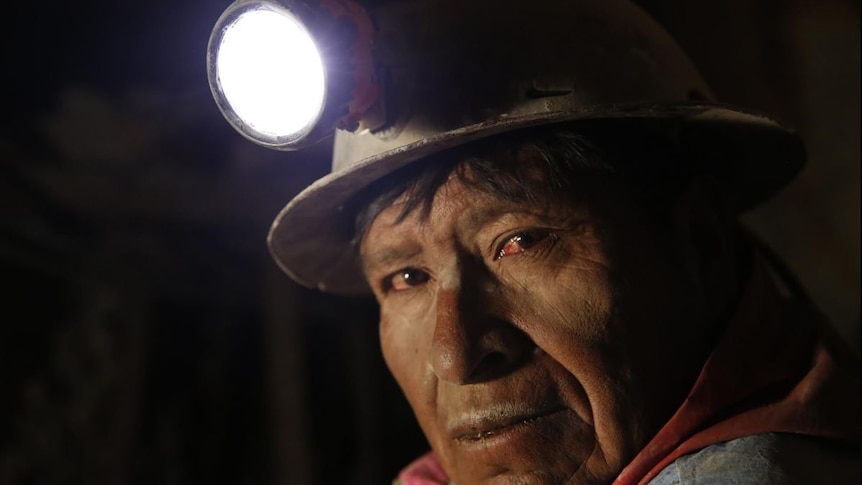An close up of an underground silver miner in Cerro Rico