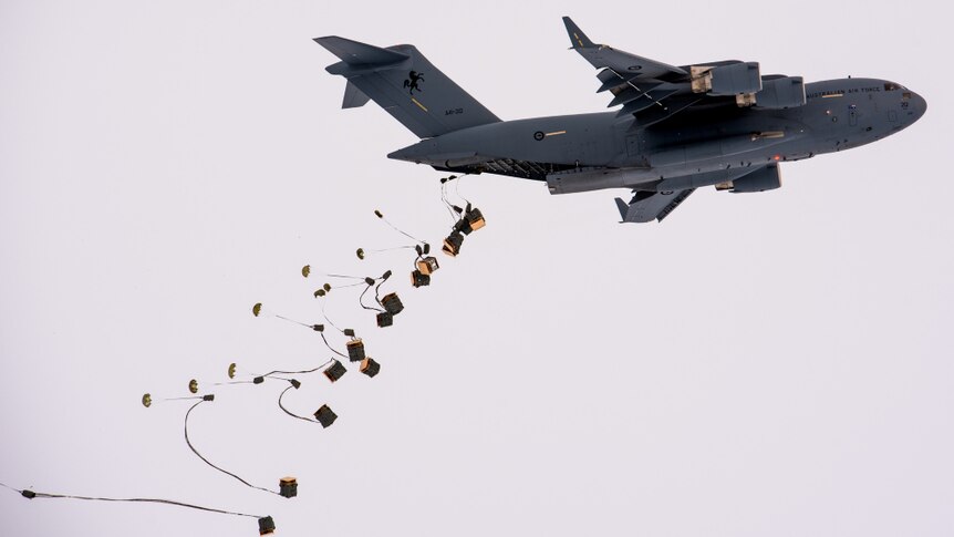 SINGLE USE ONLY (permission required) A C-17 drops cargo off in Antarctica