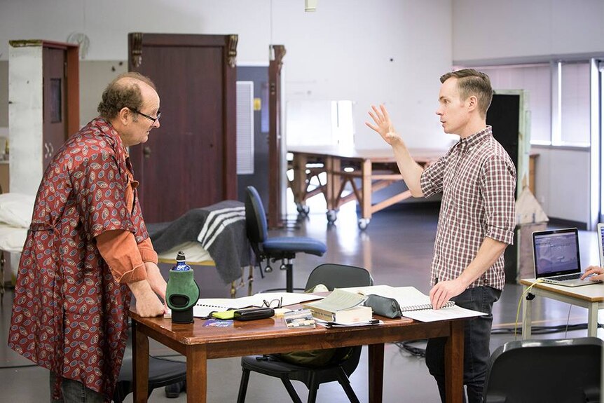 Theatre director Corey McMahon (right) during rehearsal.