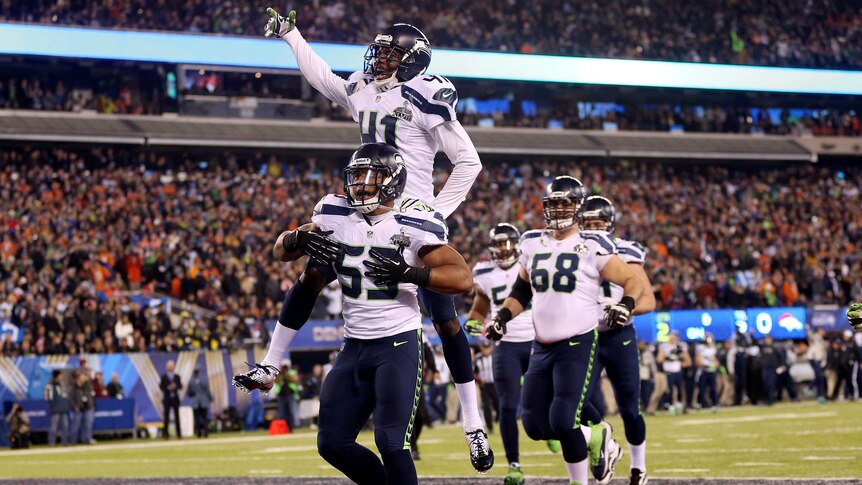 Malcolm Smith celebrates a touch down for Seattle