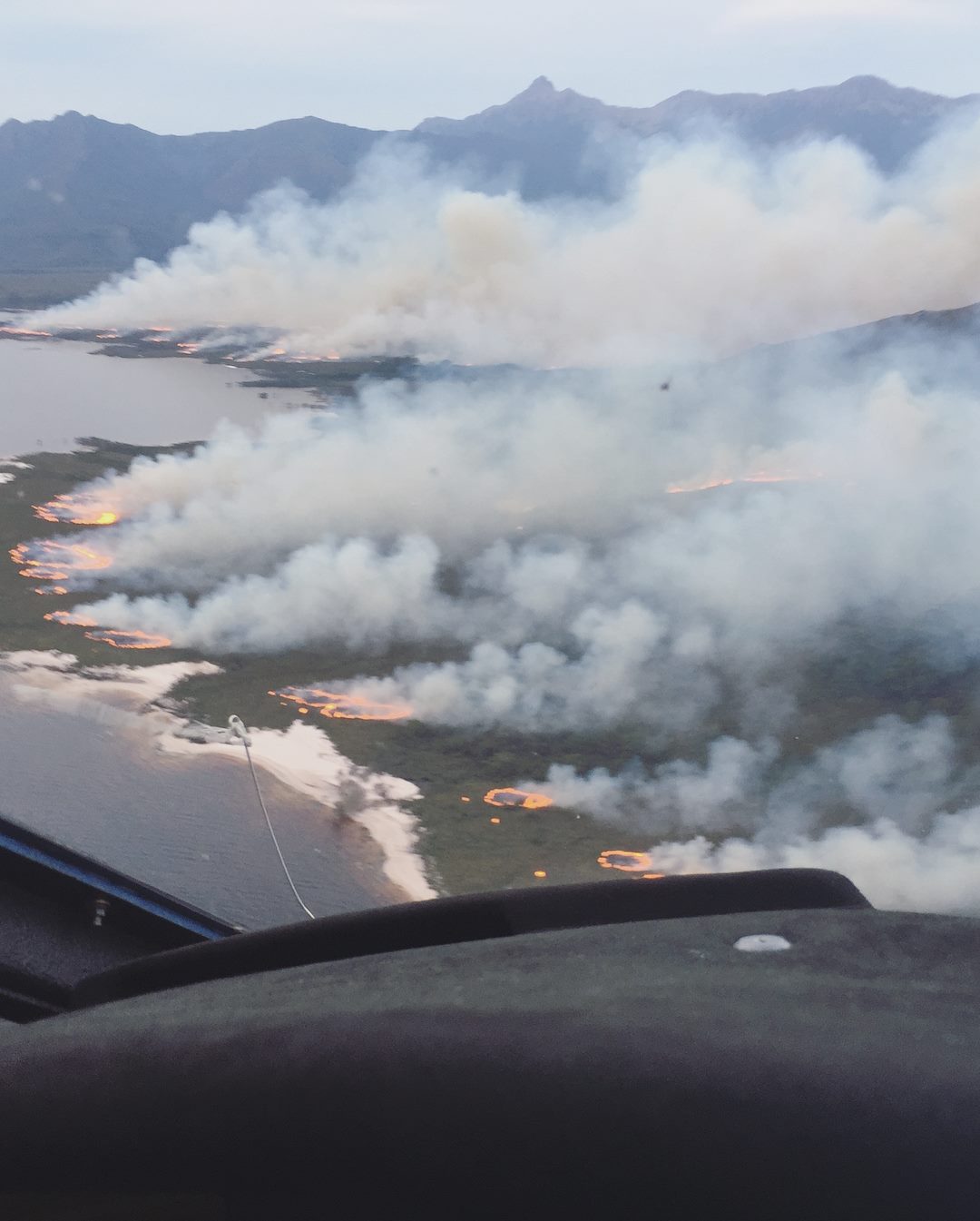 Rotor-Lift Aviation aircraft over bushfire in Tasmania.