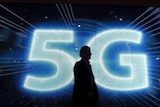 5G sign with a silhouette of a man