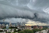 Ominous storm cloud looms over Sydney city