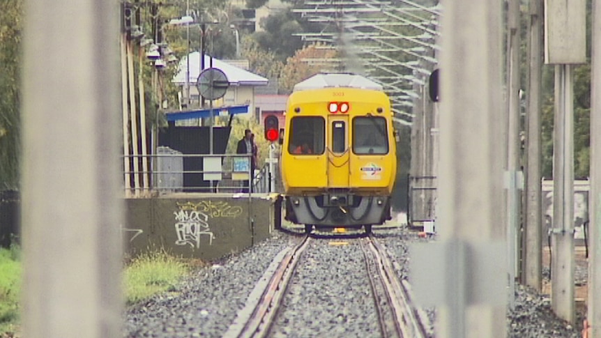 Adelaide train at a rail station