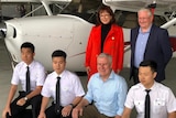 Anne Webster, Simon Clemence and Michael McCormack smiling in a photo with Chinese pilots.