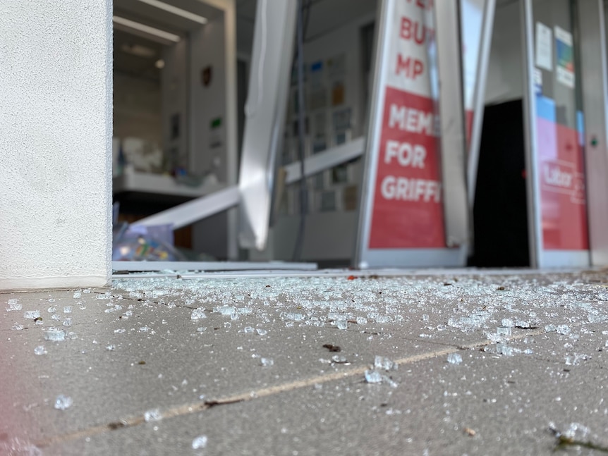 Shattered glass at the vandalized entrance to MP Terri Butler's office