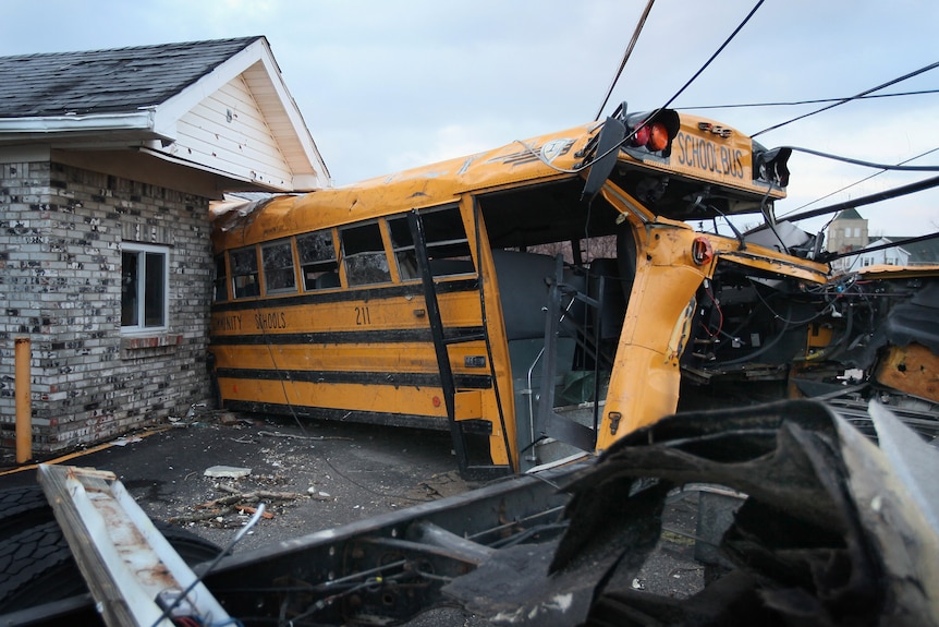 Bus lodged in home after tornado