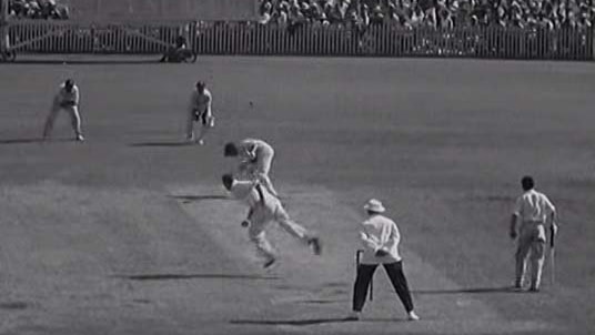 Frank Tyson bowls against Australia