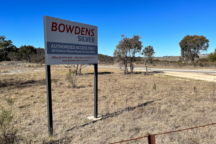 Mine site in foreground, dry parched ground in paddock 