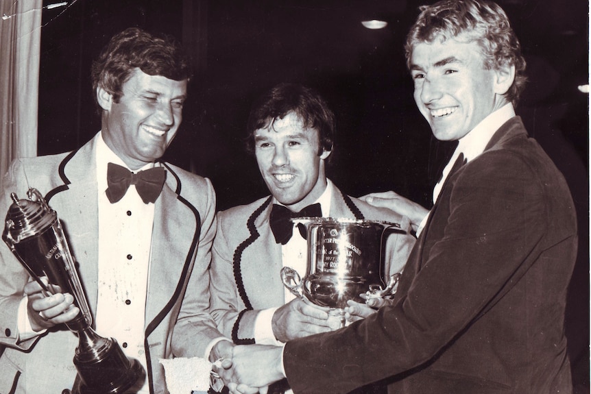Rale Rasic, Jim Rooney and John Kosmina at an awards night.